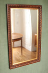 Beautiful Oak Mirror with Thumbnail Carving  Early 20th century oak mirror with wonderful dark patina.&nbsp; Fully restored with new real-gilt leaf slip.&nbsp; Ready to hang  D40 x W530 x H875mm