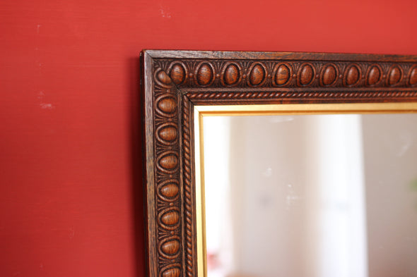 Edwardian Oak Mirror with Thumbnail Carving