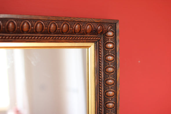 Edwardian Oak Mirror with Thumbnail Carving