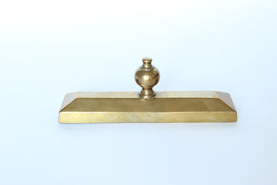 Early to mid-century large brass paperweight.  Lovely heft and patina.  W43 x H67 x L190mm