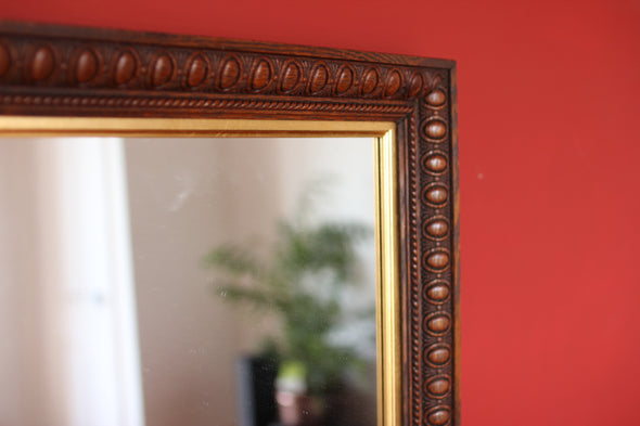 Edwardian Oak Mirror with Thumbnail Carving