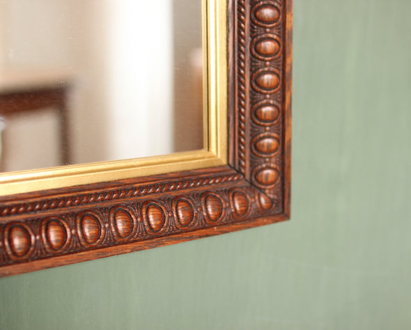 Edwardian Oak Mirror with Thumbnail Carving