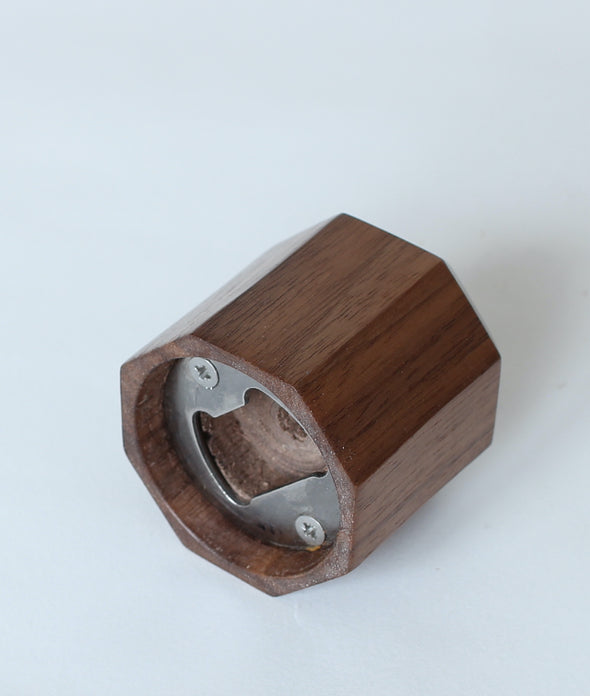 OctaBot©&nbsp;bottle opener.  Handmade octagonal bottle opener.  Made with no more than a pencil, plane, chisel and hand drill.&nbsp;  American Walnut or Native Irish Oak.&nbsp;  H48mm D47mm  Irish craft handmade in Dublin for Gallery33